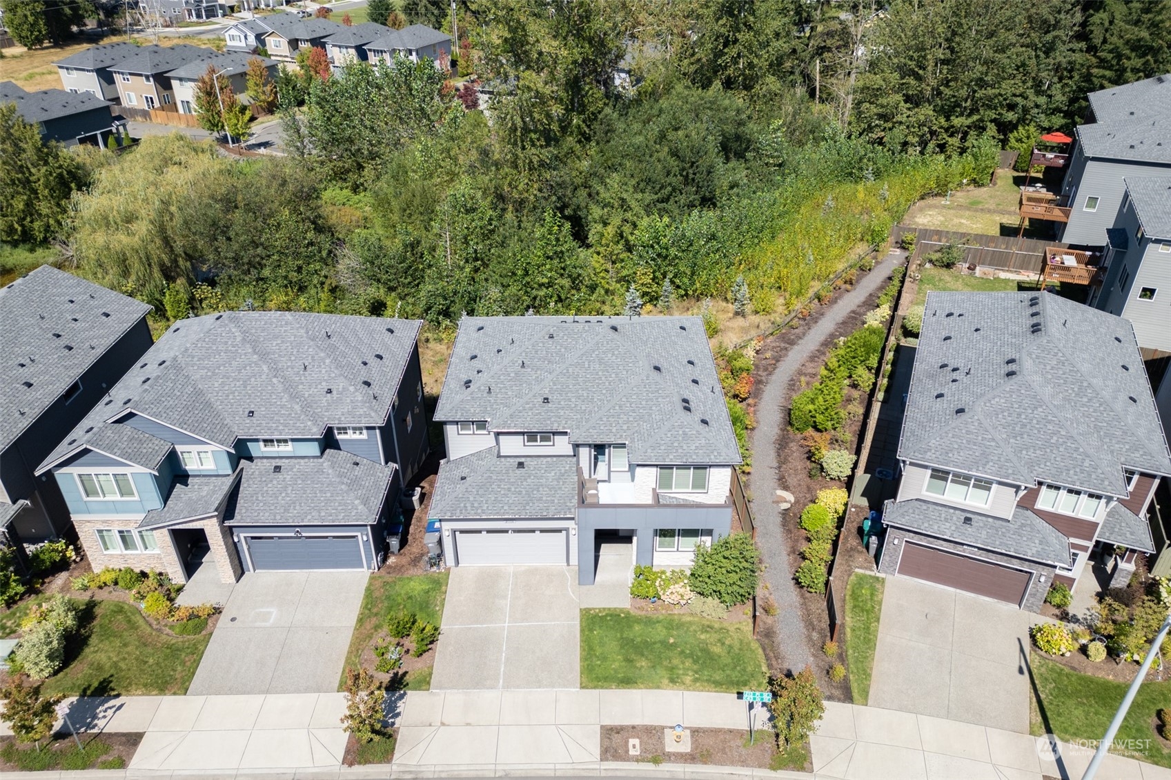 21314 43rd Drive Southeast Bothell, WA 98021 - Photo 3 of 38 an aerial view of residential houses with outdoor space