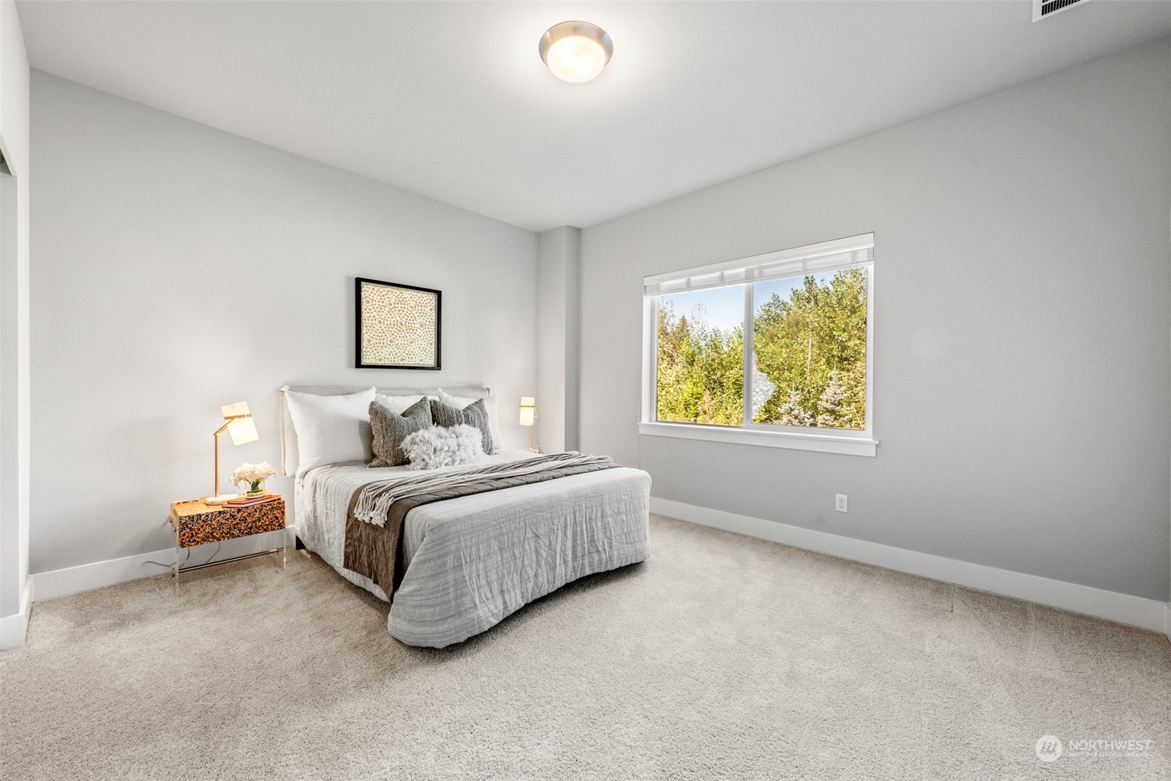 21314 43rd Drive Southeast Bothell, WA 98021 - Photo 33 of 38 a spacious bedroom with a bed and a window