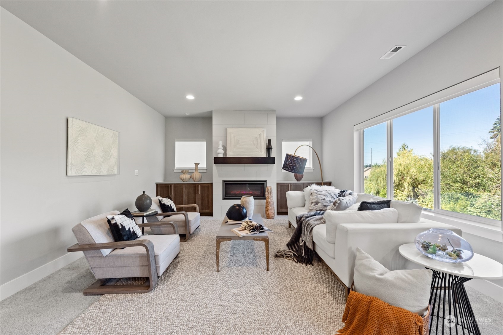 21314 43rd Drive Southeast Bothell, WA 98021 - Photo 5 of 38 a living room with furniture fireplace and a large window