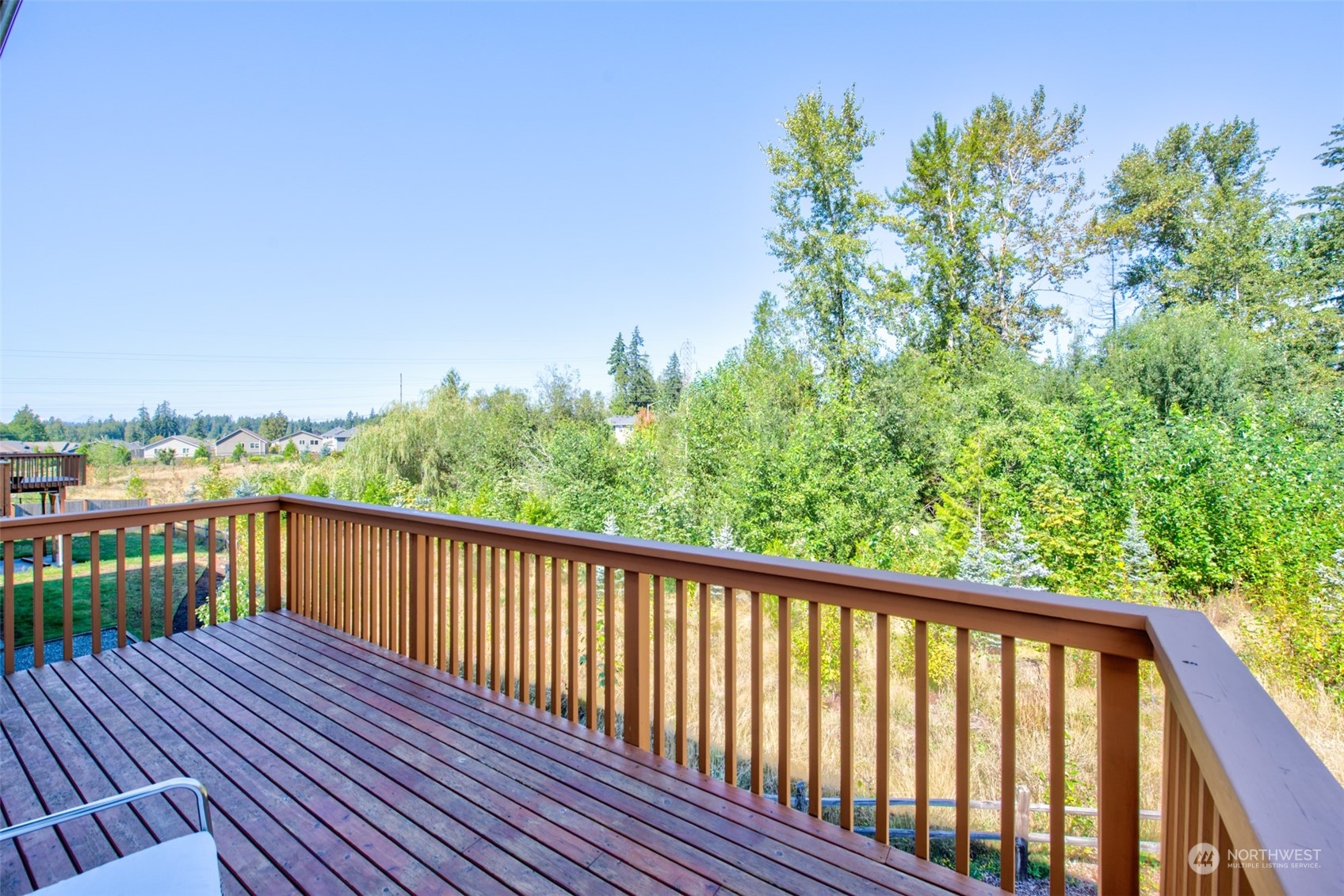 21314 43rd Drive Southeast Bothell, WA 98021 - Photo 7 of 38 a balcony with wooden floor and fence