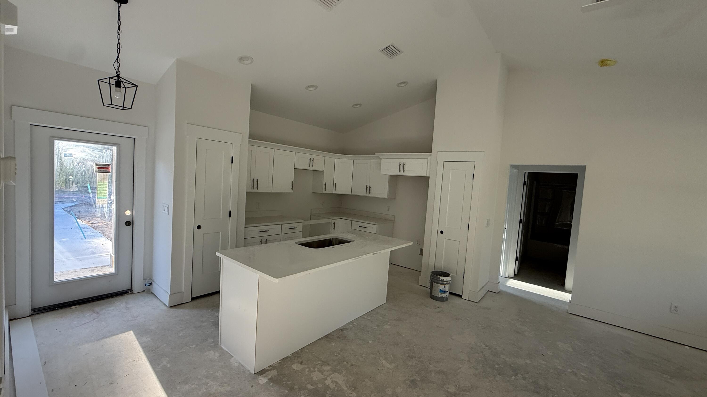 4181 Luar Chipley, FL 32428 - Photo 14 of 28 a kitchen that has a sink a stove and a refrigerator
