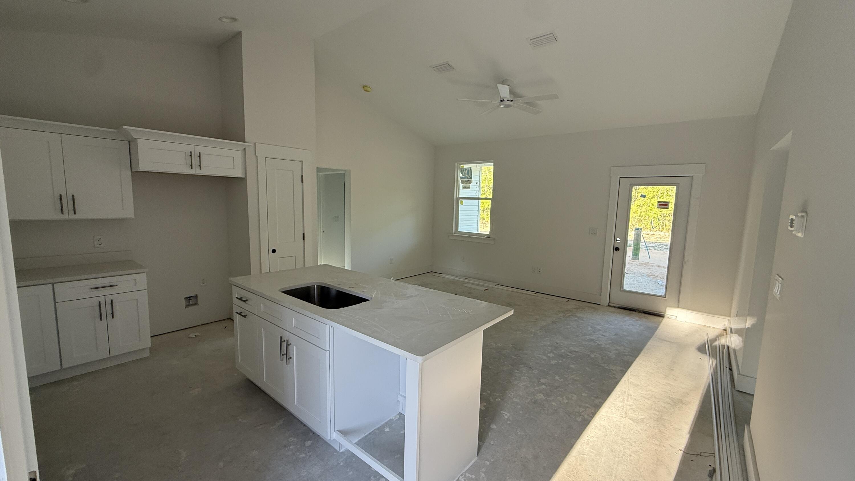 4181 Luar Chipley, FL 32428 - Photo 15 of 28 a kitchen with granite countertop a sink and window