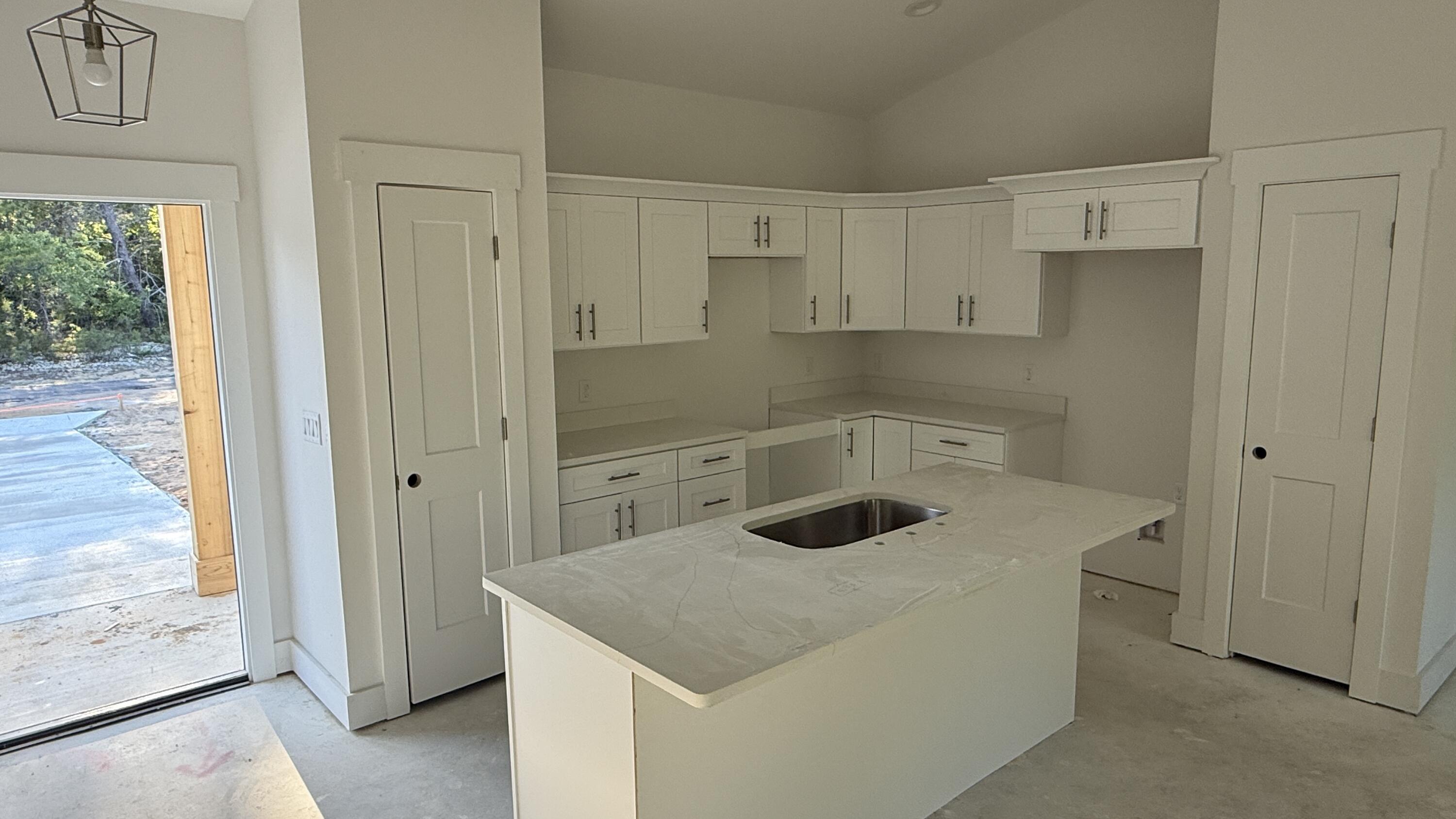 4181 Luar Chipley, FL 32428 - Photo 26 of 28 a kitchen that has a sink and a stove in it