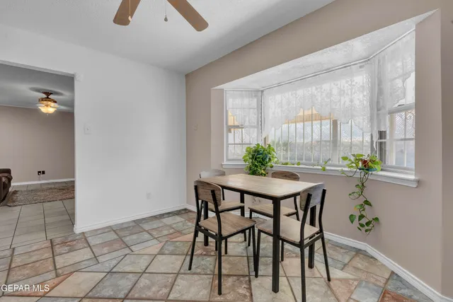 a bathroom with a shower and a sink