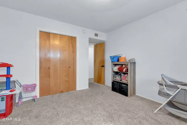 a view of a backyard of the house