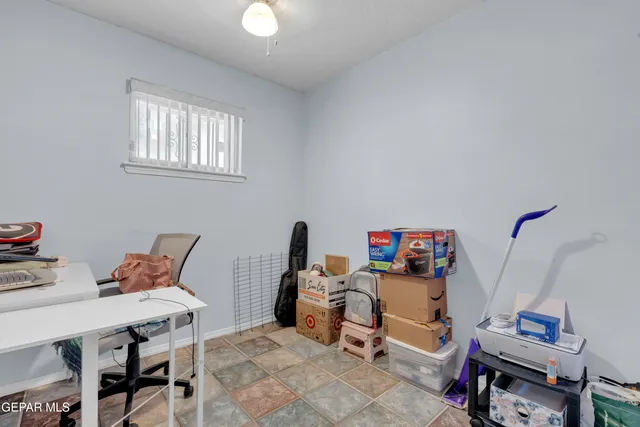 a front view of a house with sitting area