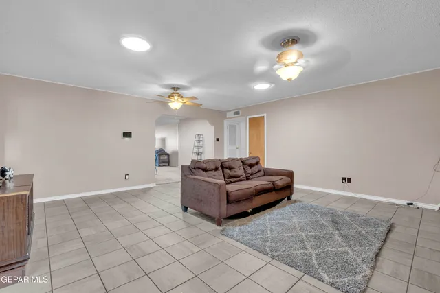 a view of a bathroom with a sink and a mirror