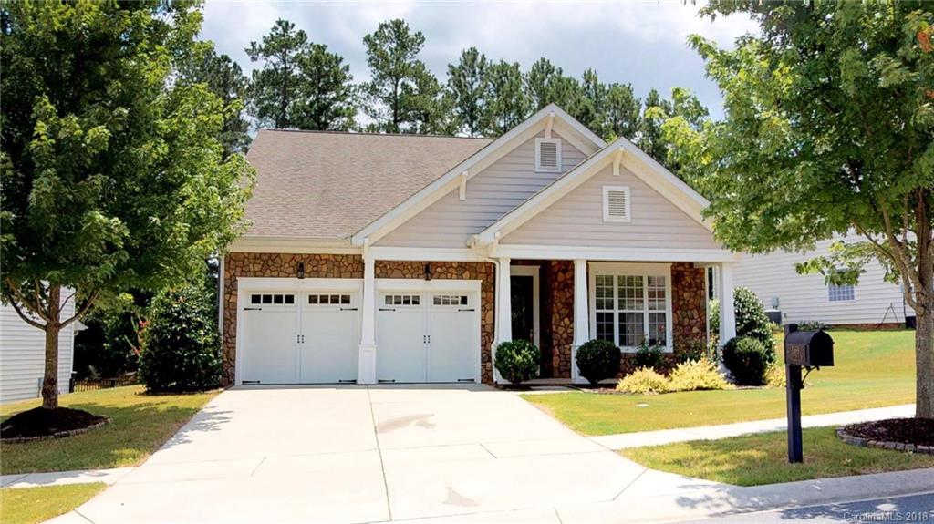 1369 Secret Path Drive Fort Mill, SC 29708 - Photo 1 of 22 a front view of a house with a yard
