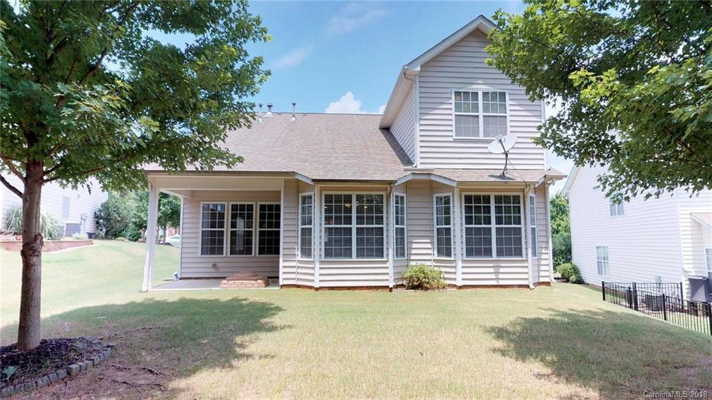 1369 Secret Path Drive Fort Mill, SC 29708 - Photo 19 of 22 a front view of a house with a outdoor space