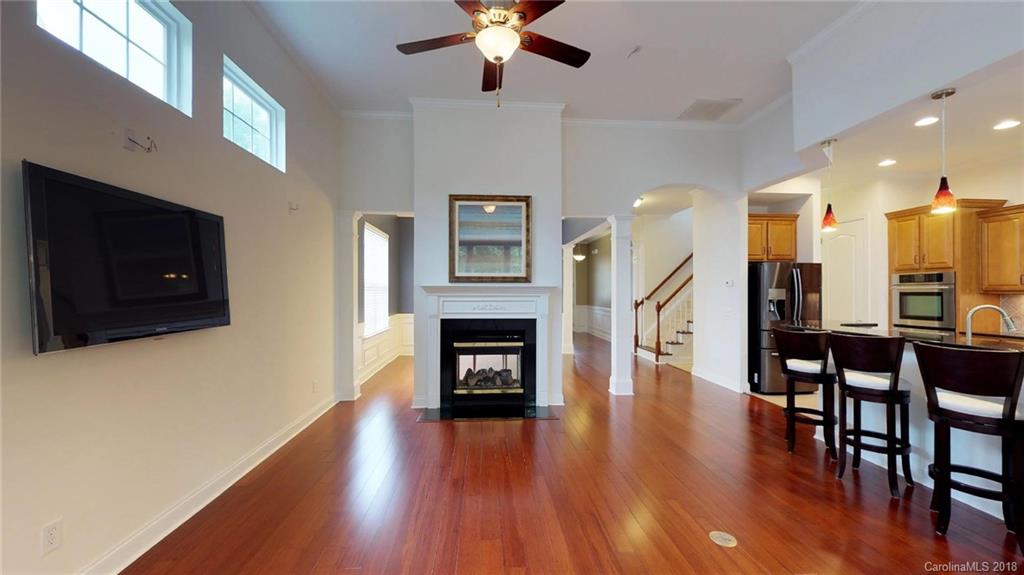1369 Secret Path Drive Fort Mill, SC 29708 - Photo 9 of 22 a living room with fireplace furniture and a flat screen tv