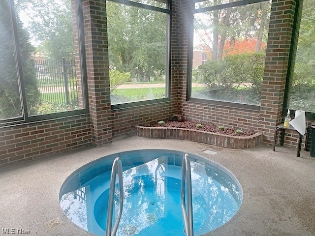 2385 Covington Road, Unit 302 Akron, OH 44313 - Photo 19 of 19 View of swimming pool featuring a patio