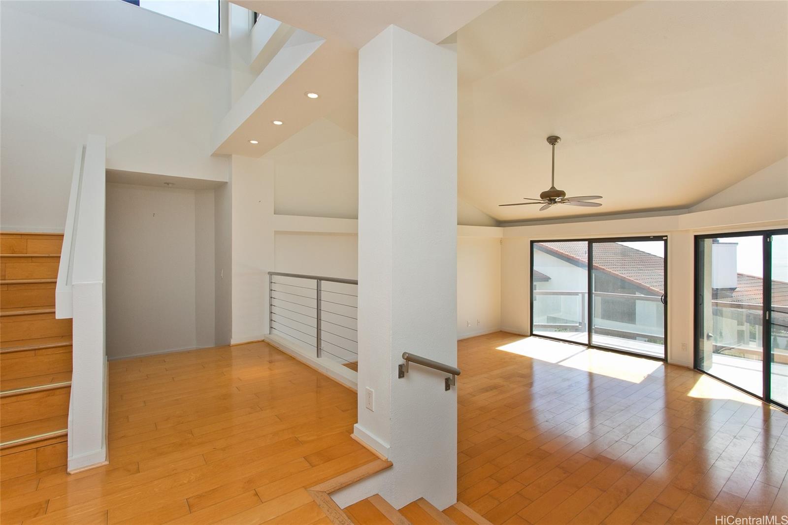 600 Kahiau Loop Honolulu, HI 96821 - Photo 11 of 19 a view of a livingroom with a staircase
