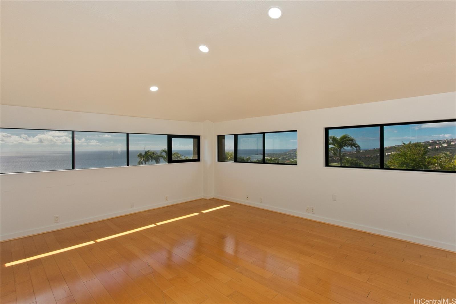 600 Kahiau Loop Honolulu, HI 96821 - Photo 17 of 19 a view of an empty room with windows