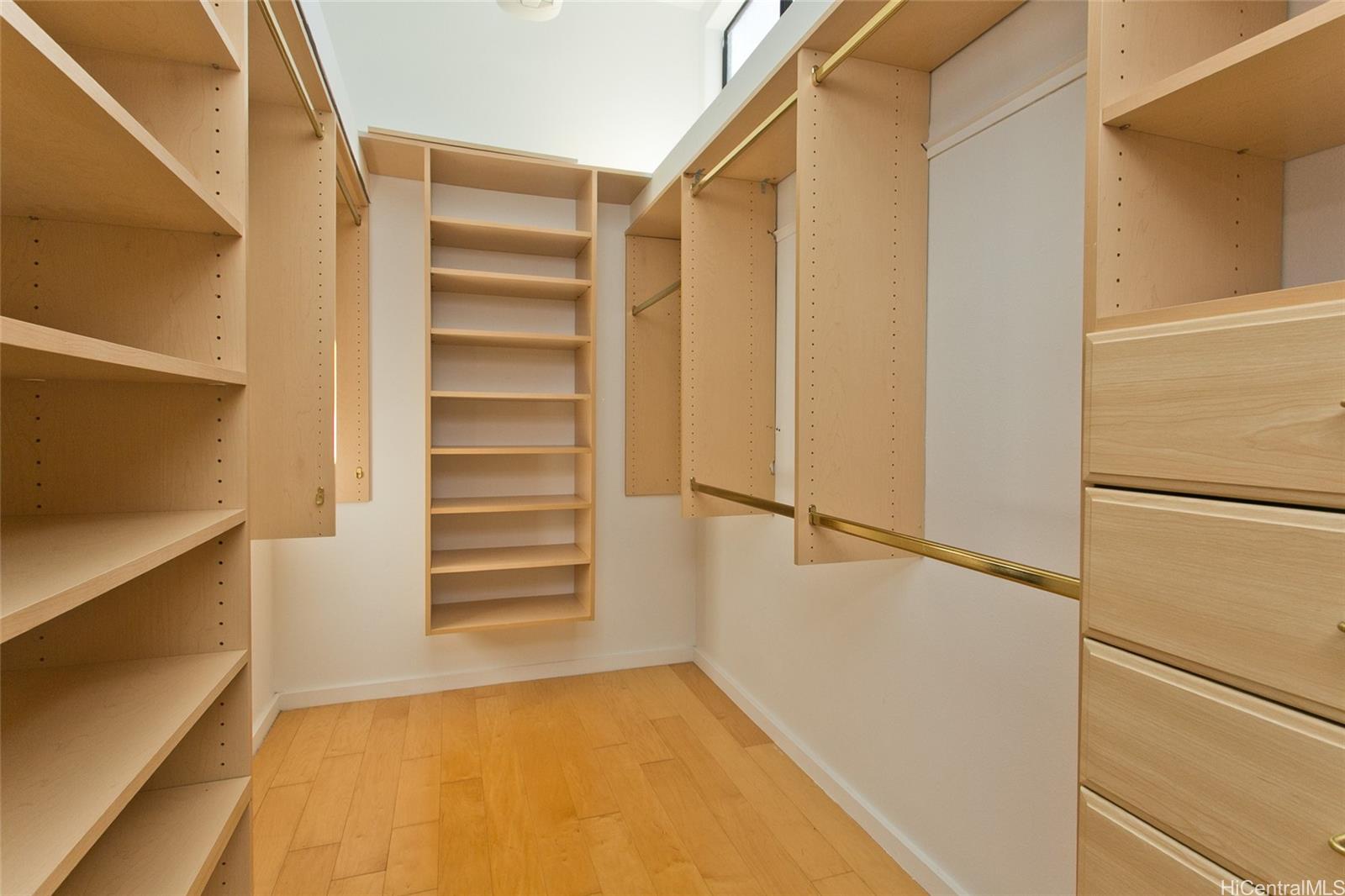 600 Kahiau Loop Honolulu, HI 96821 - Photo 19 of 19 a view of walk in closet with empty racks