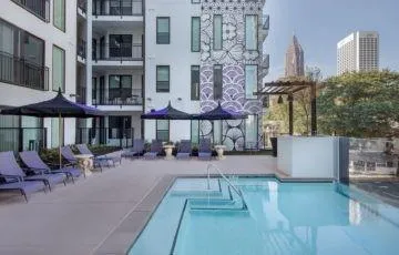 a view of a building with sitting area