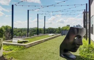 a view of a swimming pool with a porch