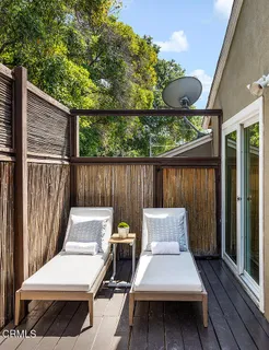 a view of outdoor seating space with furniture