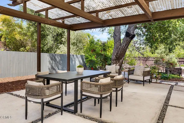 a outdoor living space with furniture and garden view