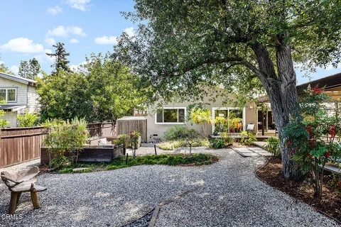 a view of outdoor sitting area with furniture