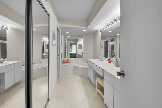 a living room with furniture a rug and a large window