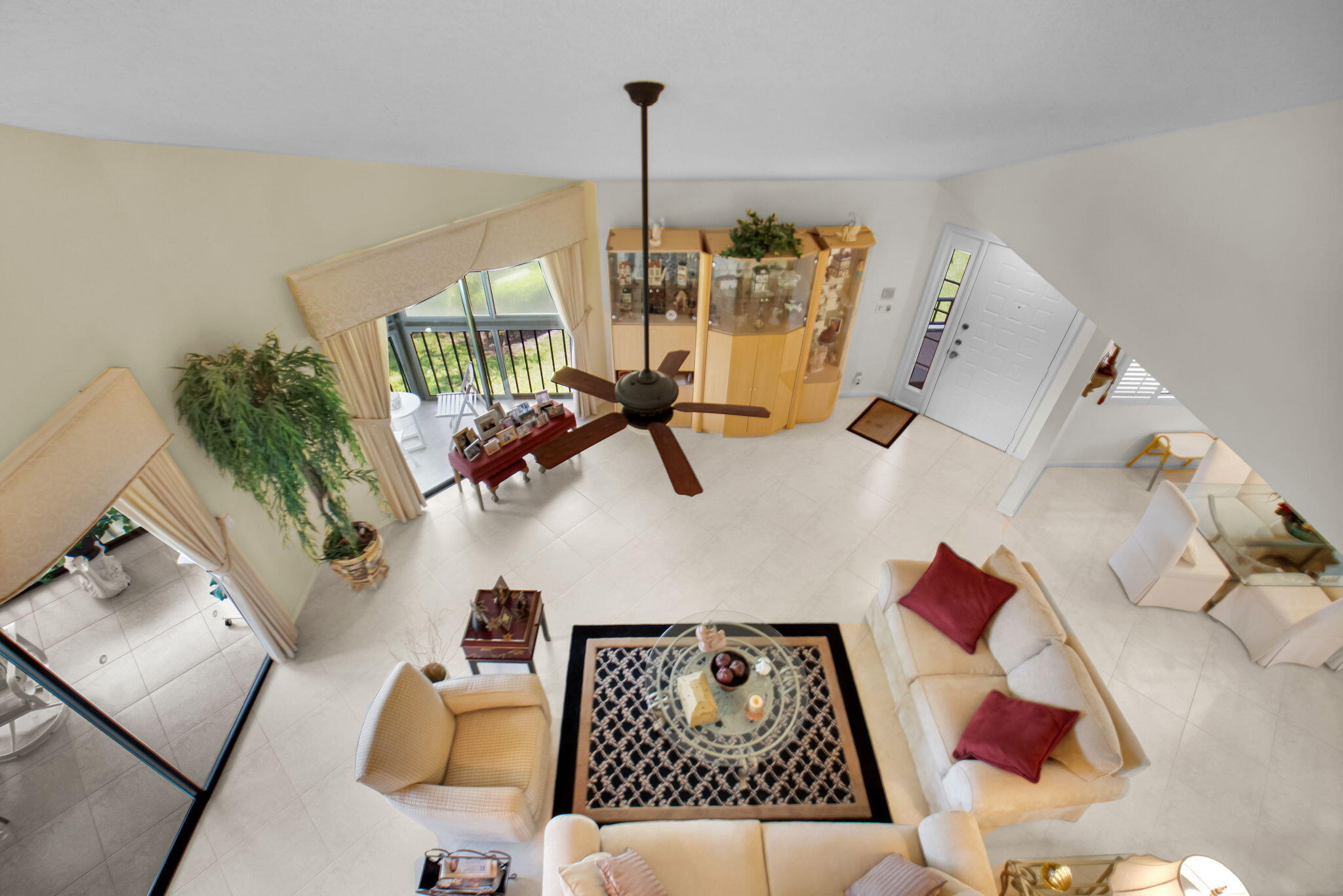 7380 Clunie Place, Unit 13006 Delray Beach, FL 33446 - Photo 21 of 67 a living room with furniture and a wooden floor