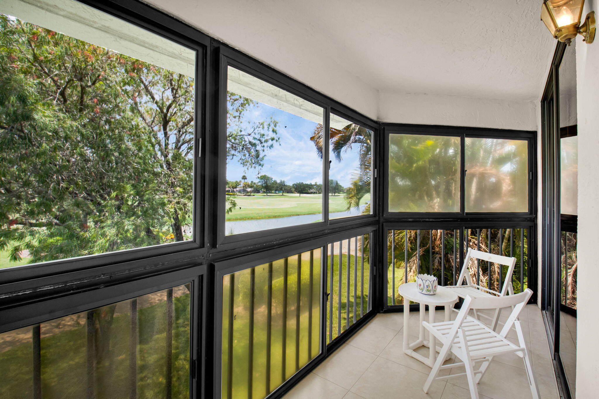 7380 Clunie Place, Unit 13006 Delray Beach, FL 33446 - Photo 27 of 67 a view of a city from a large window