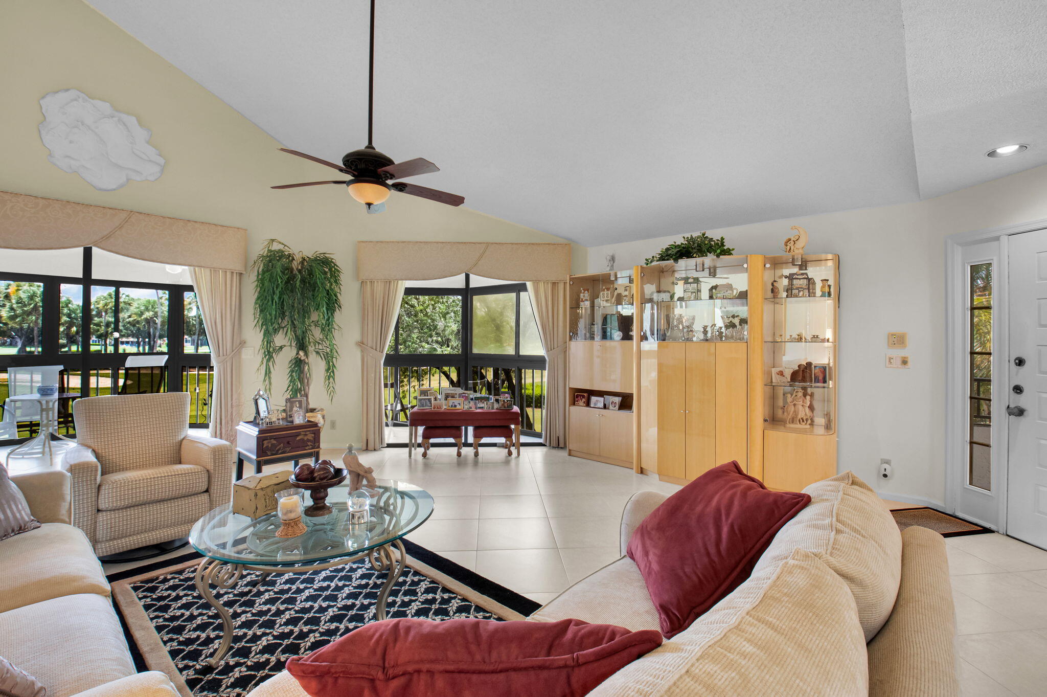 7380 Clunie Place, Unit 13006 Delray Beach, FL 33446 - Photo 3 of 67 a living room with furniture and a large window