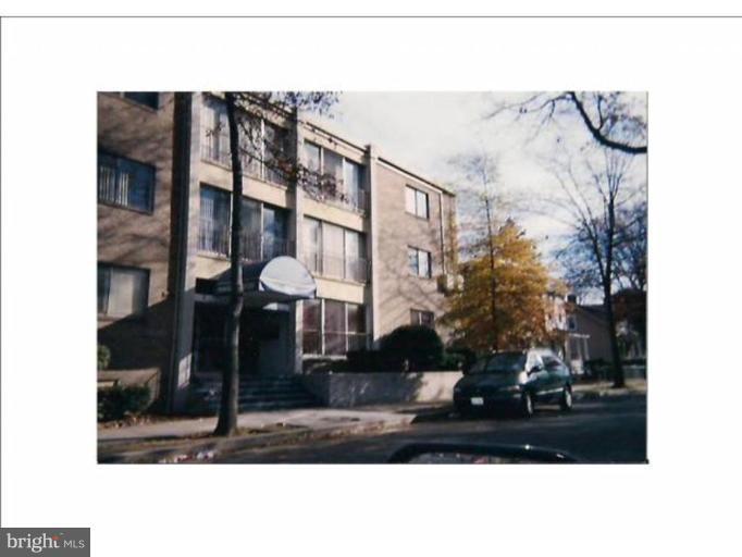 1920 Naylor Road Southeast, Unit T3 Washington, DC 20020 - Photo 1 of 1 a black and white photo of a house