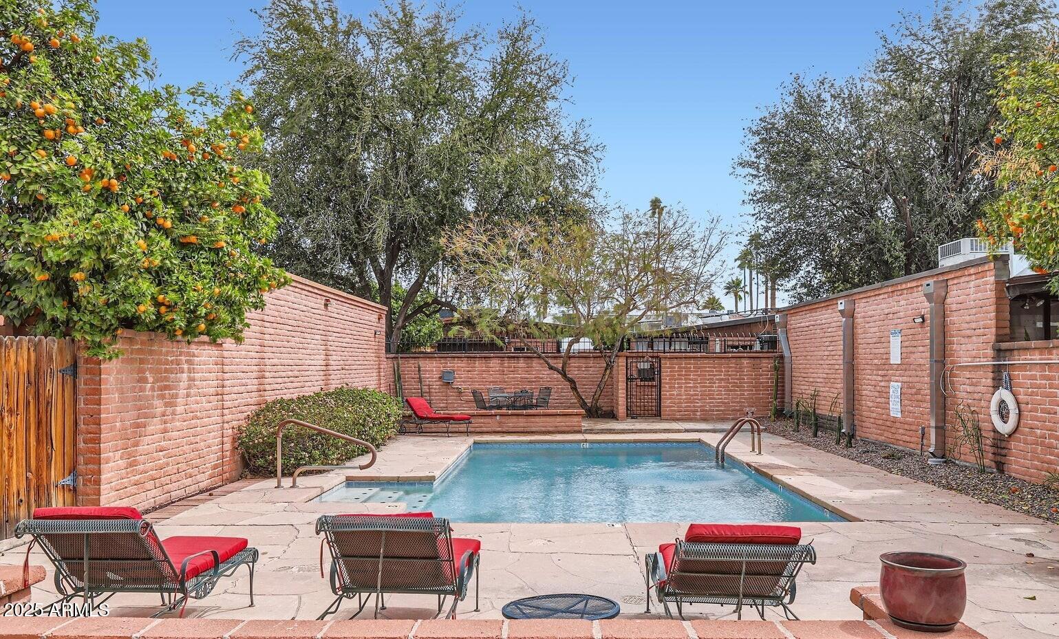 3046 North 32nd Street, Unit 333 Phoenix, AZ 85018 - Photo 16 of 16 a backyard of a house with seating space
