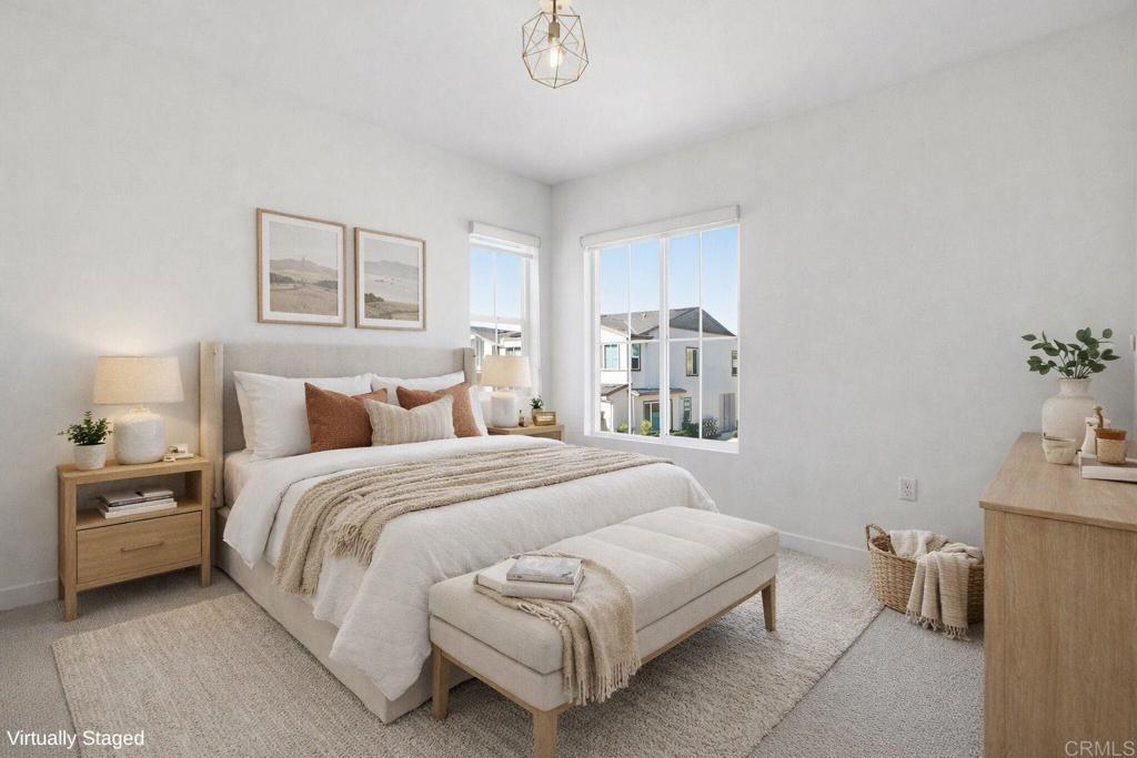 35131 Rangpur Lane Fallbrook, CA 92028 - Photo 13 of 61 a bedroom with a bed and a couch