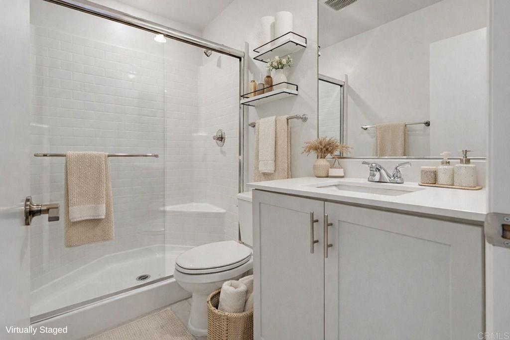 35131 Rangpur Lane Fallbrook, CA 92028 - Photo 14 of 61 a bathroom with a sink a toilet and shower