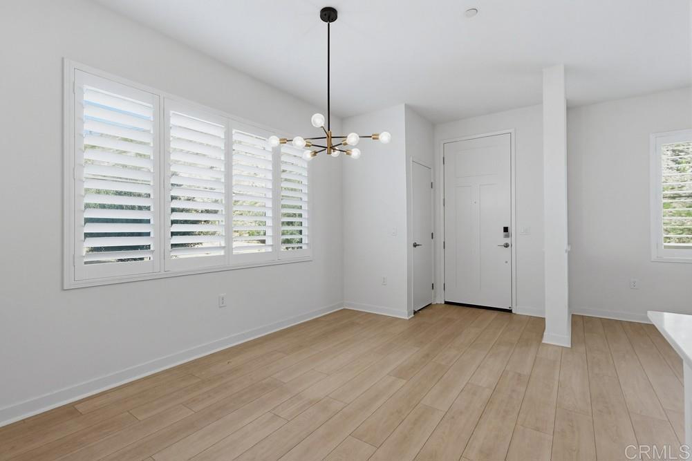 35131 Rangpur Lane Fallbrook, CA 92028 - Photo 19 of 61 wooden floor in an empty room with a window