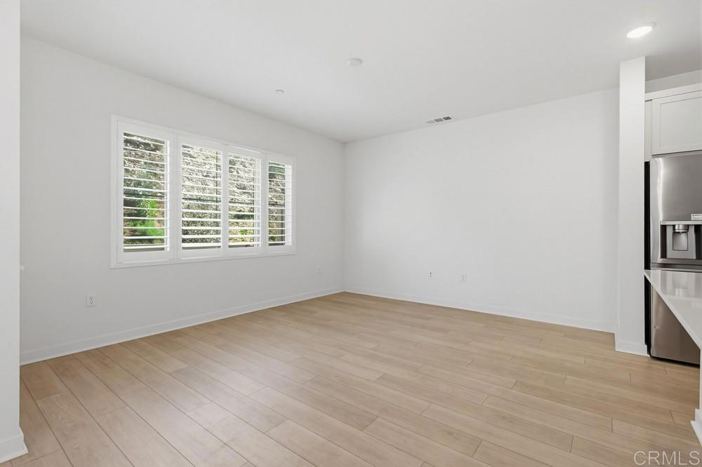 35131 Rangpur Lane Fallbrook, CA 92028 - Photo 22 of 61 wooden floor in an empty room with a window