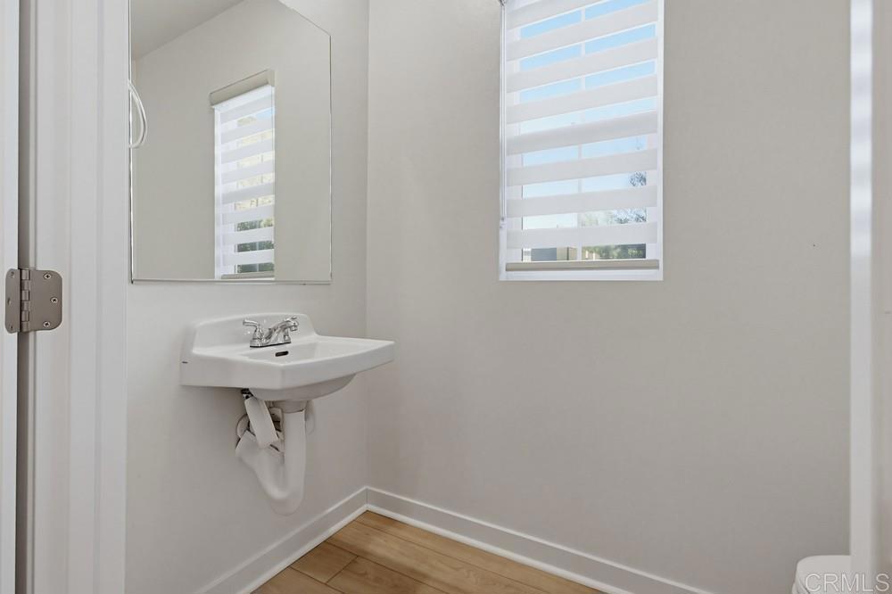 35131 Rangpur Lane Fallbrook, CA 92028 - Photo 32 of 61 a bathroom with a sink and a window