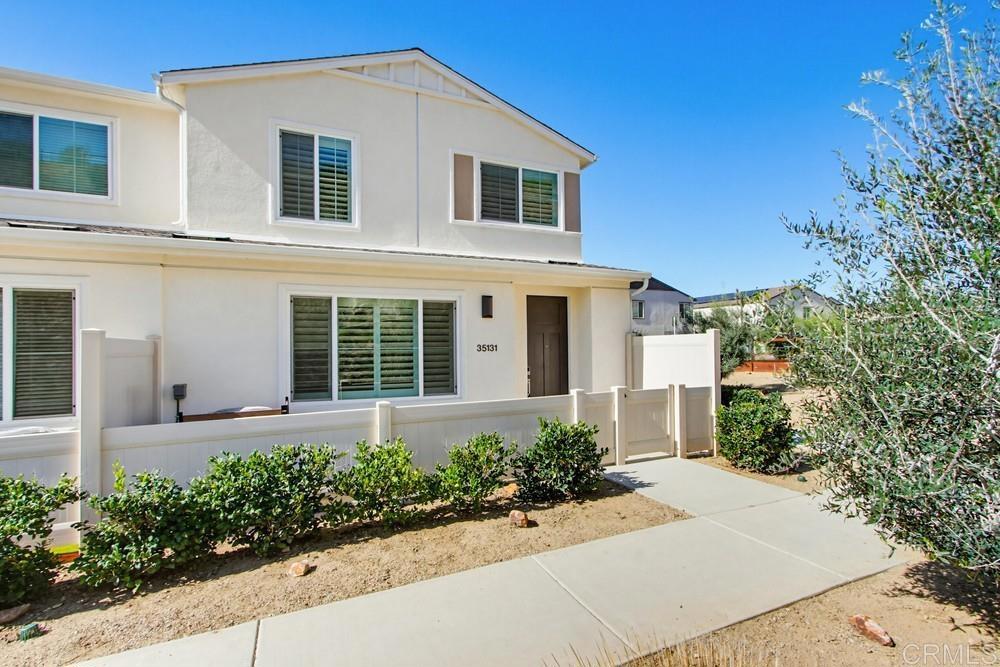 35131 Rangpur Lane Fallbrook, CA 92028 - Photo 4 of 61 front view of a house with a yard