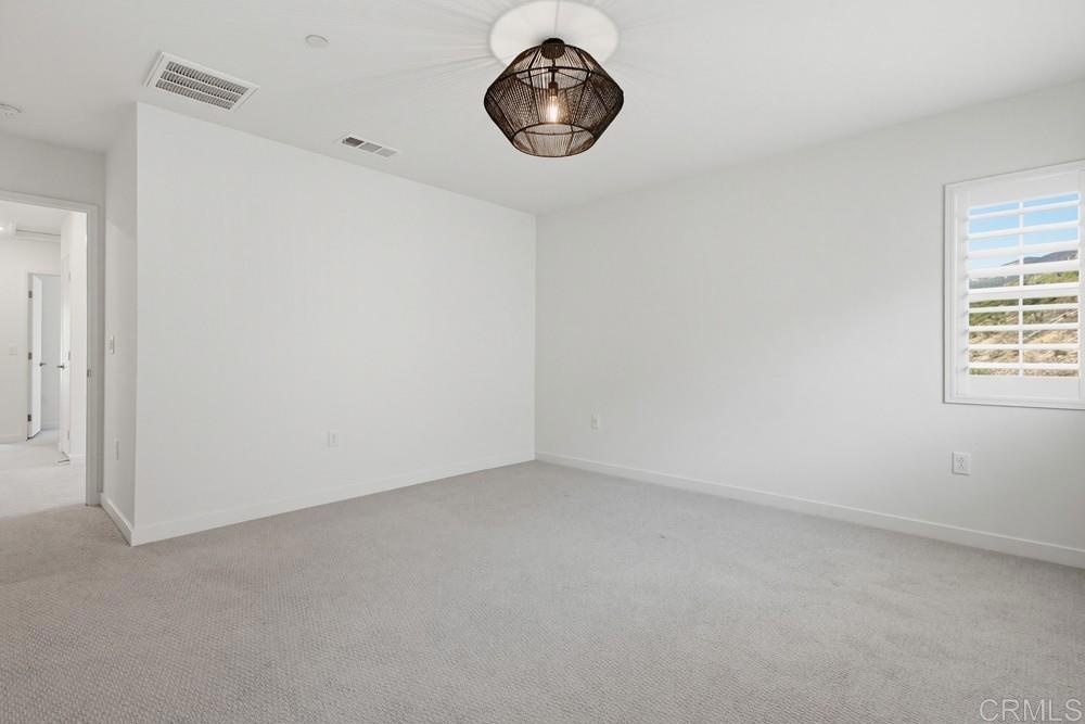 35131 Rangpur Lane Fallbrook, CA 92028 - Photo 44 of 61 a view of an empty room with a window