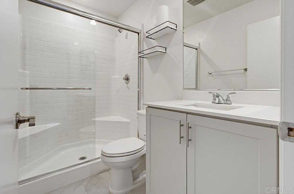 35131 Rangpur Lane Fallbrook, CA 92028 - Photo 49 of 61 a bathroom with a sink a toilet and shower