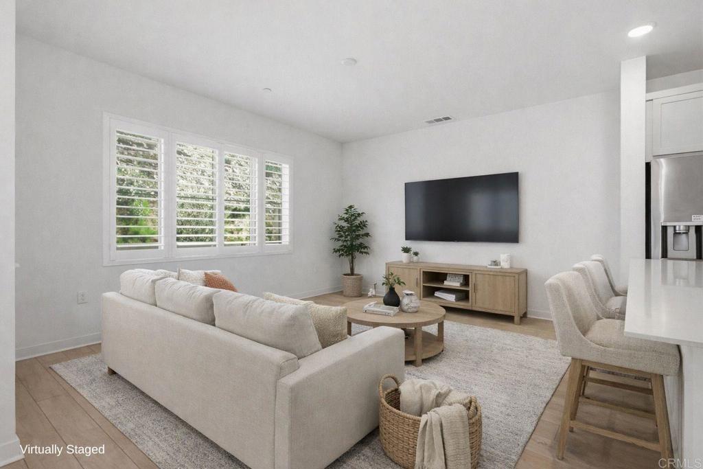 35131 Rangpur Lane Fallbrook, CA 92028 - Photo 9 of 61 a living room with furniture and a flat screen tv