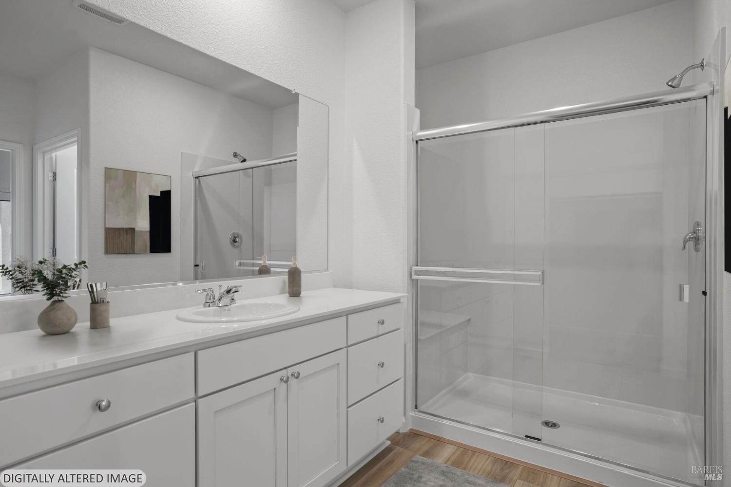 2241 Front Porch Lane Rio Vista, CA 94571 - Photo 18 of 23 a bathroom with a double vanity sink mirror and shower