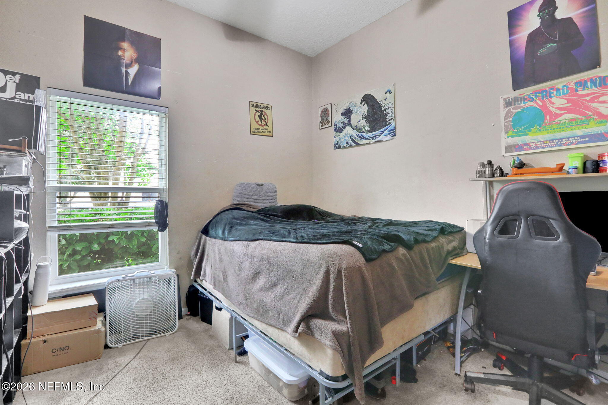 706 Golden Lake Loop St. Augustine, FL 32084 - Photo 21 of 32 a bedroom with a bed and a window