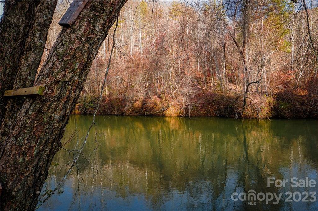 Lot 11 Destiny Dr Mill Spring, Unit LOT 11 Mill Spring, NC 28756 - Photo 24 of 28 a view of an ocean with a house
