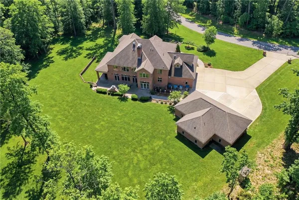 an aerial view of a house with a garden