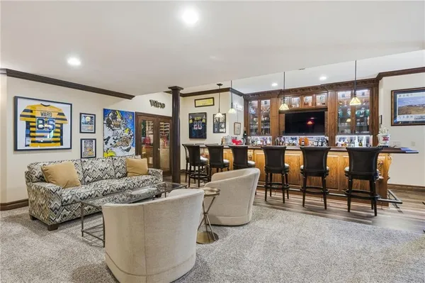 a dining table chairs and a wooden floor
