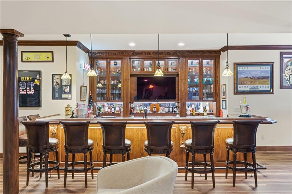 1653 Chapel Ridge Mars, PA 16046 - Photo 25 of 50 a dining table chairs and a wooden floor