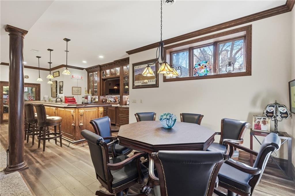 1653 Chapel Ridge Mars, PA 16046 - Photo 28 of 50 a view of a dining room with furniture a rug and wooden floor
