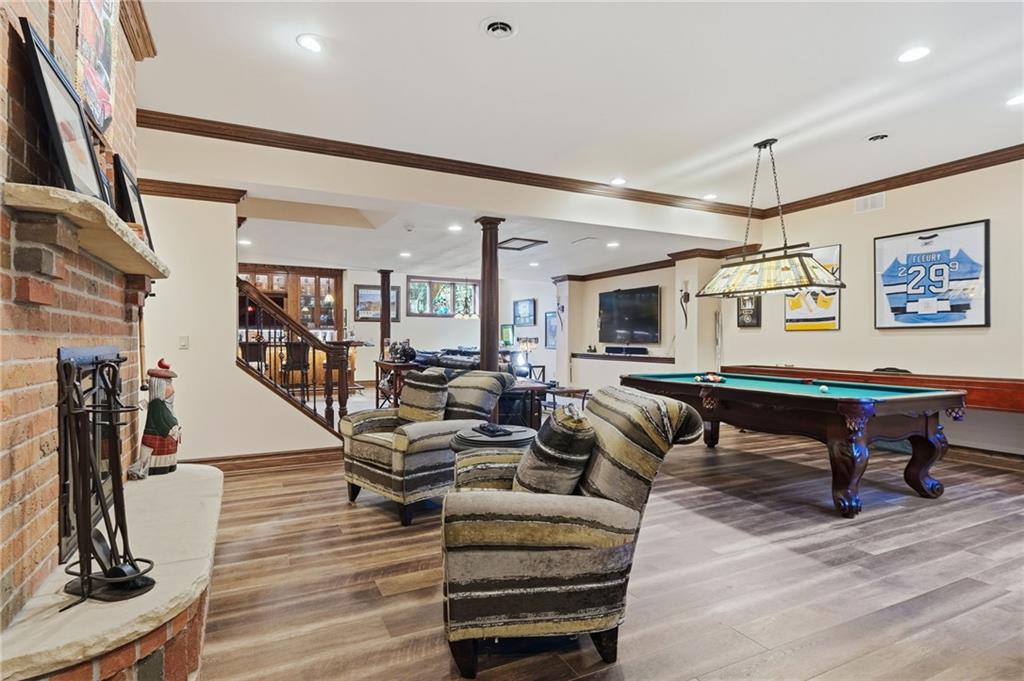 1653 Chapel Ridge Mars, PA 16046 - Photo 30 of 50 a living room with lots of furniture and a wooden floor