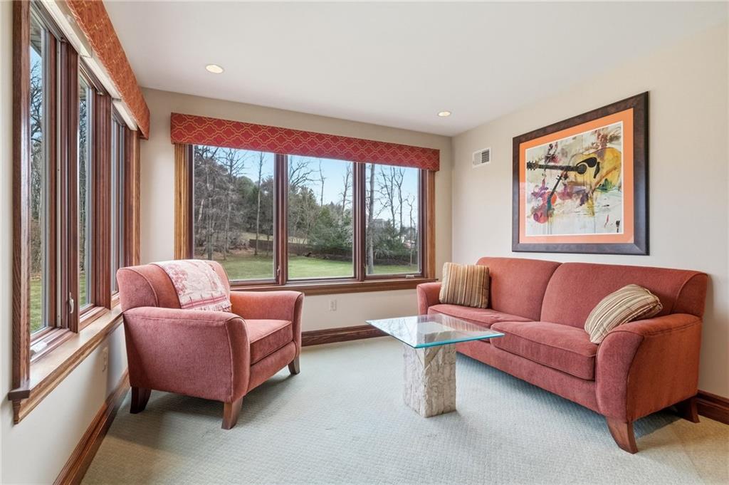 1653 Chapel Ridge Mars, PA 16046 - Photo 37 of 50 a living room with furniture and a large window