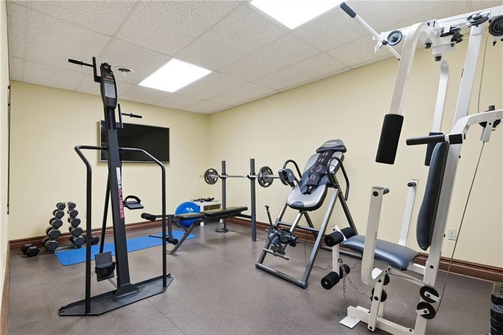 1653 Chapel Ridge Mars, PA 16046 - Photo 44 of 50 a view of a room with gym equipment