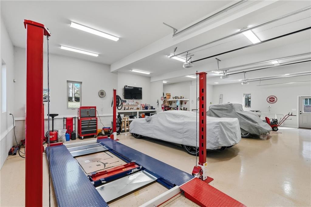 1653 Chapel Ridge Mars, PA 16046 - Photo 46 of 50 a bed room with furniture and a flat screen tv