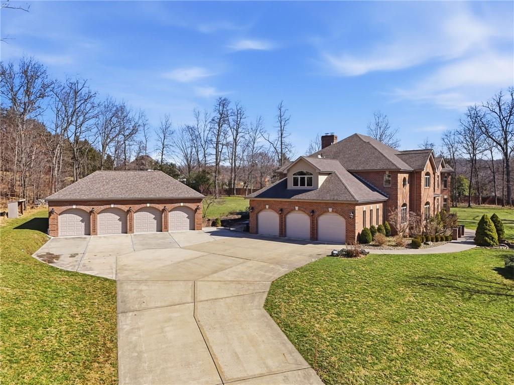 1653 Chapel Ridge Mars, PA 16046 - Photo 49 of 50 a large white building with a yard in front of it